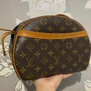 Authentic Louis Vuitton Blois,no peeling with cracking on vachetta strap only.
